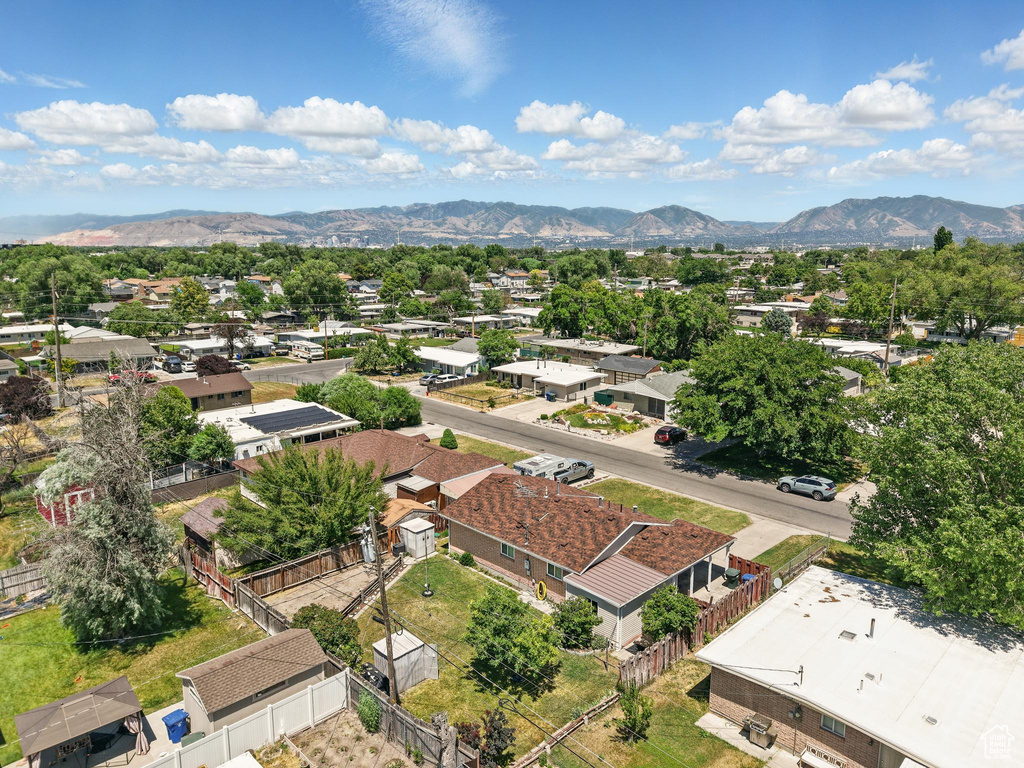 Aerial view of residential area with a mountainous background