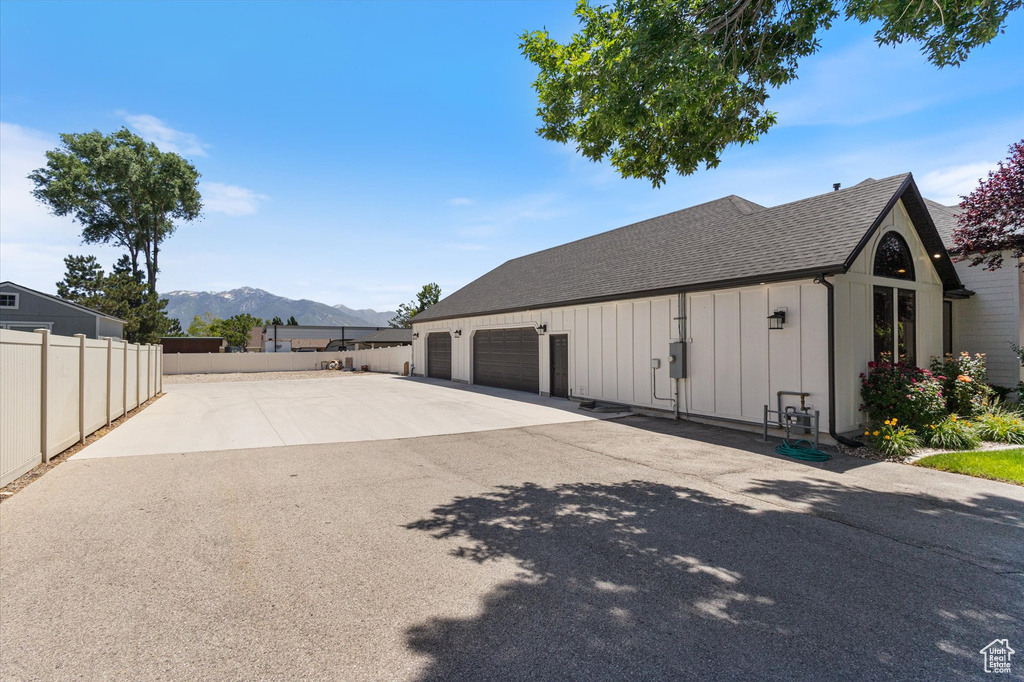 Garage featuring a mountain view
