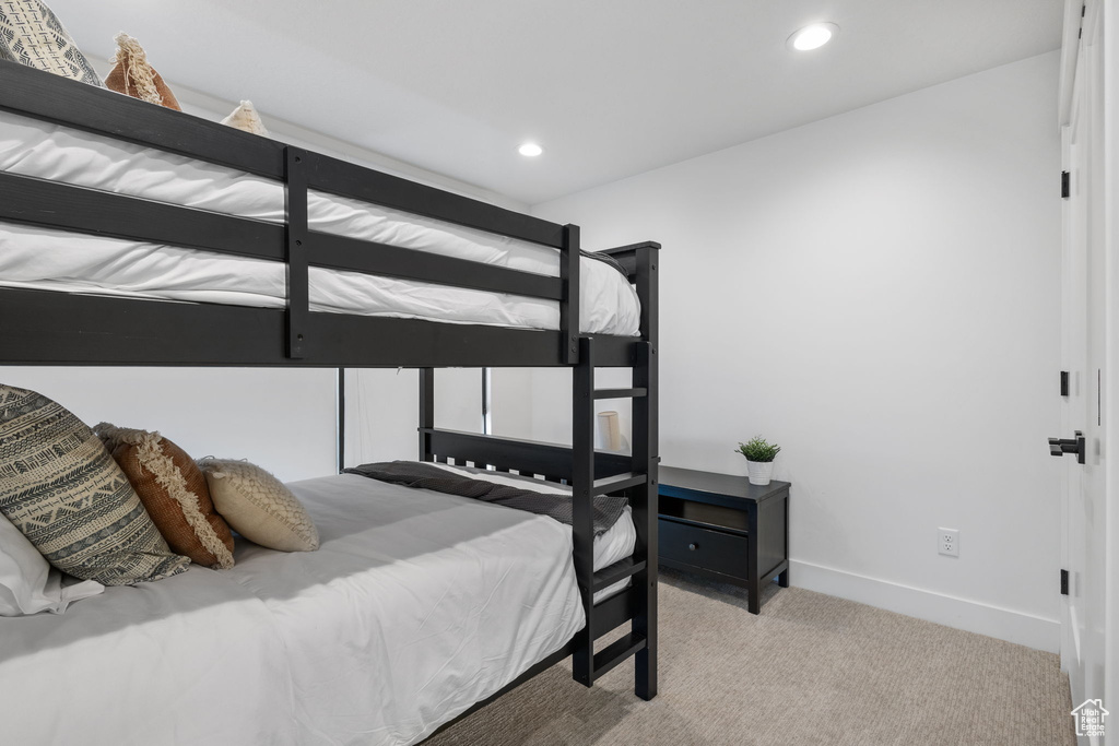 Bedroom featuring carpet flooring and recessed lighting