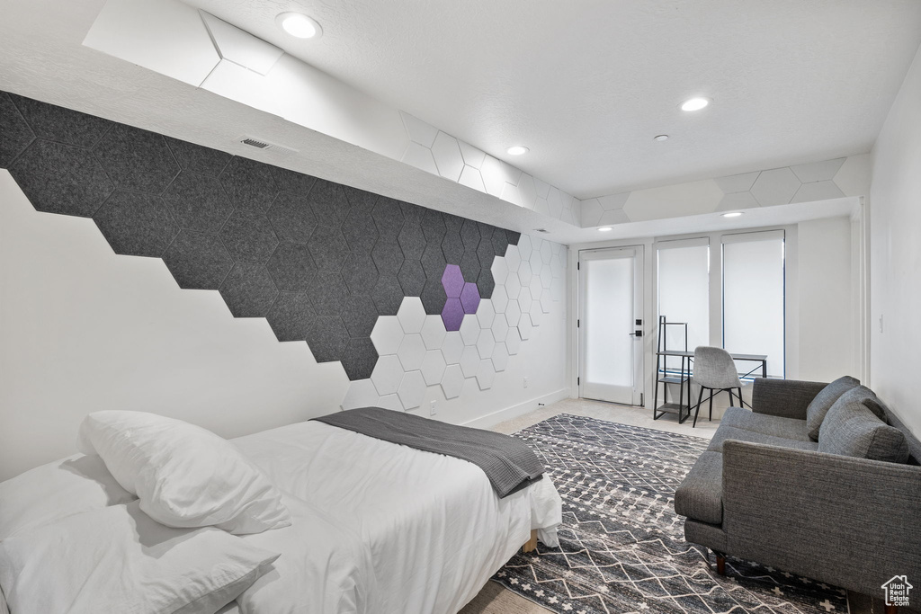 Carpeted bedroom featuring recessed lighting and baseboards