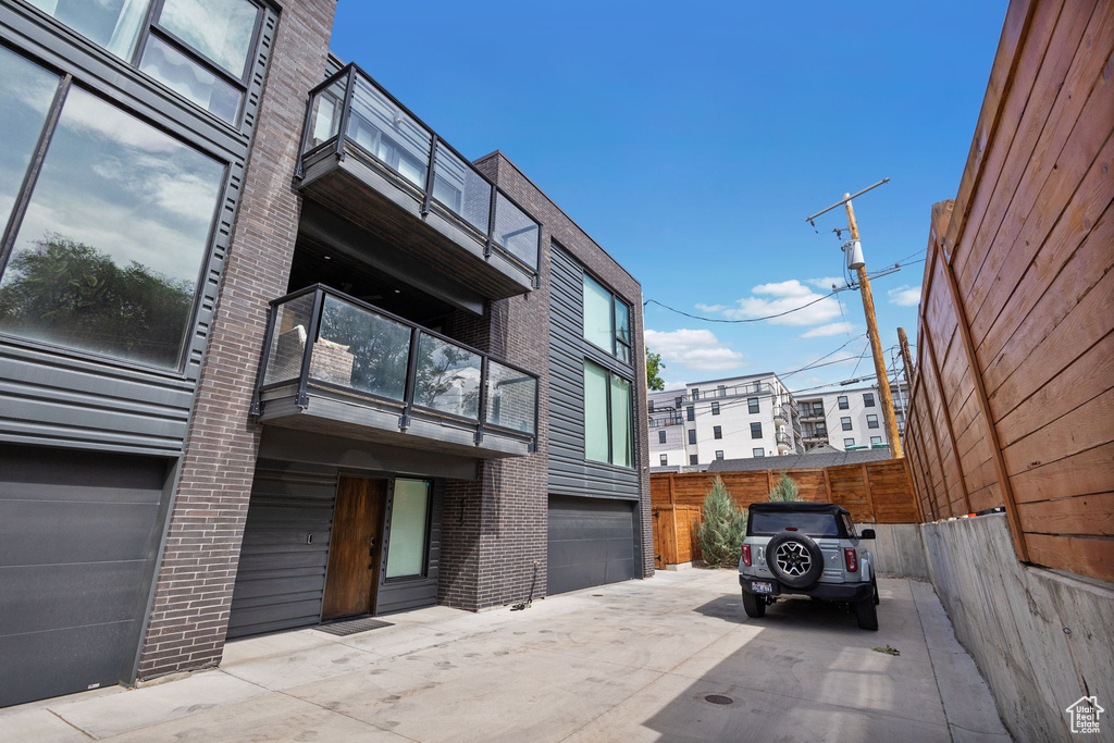 View of home\'s exterior featuring brick siding and driveway