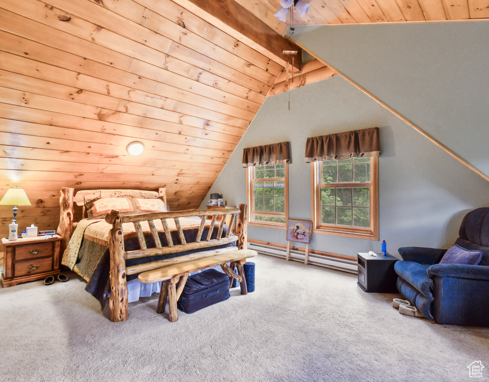 Bedroom featuring a baseboard heating unit, carpet flooring, and wood ceiling