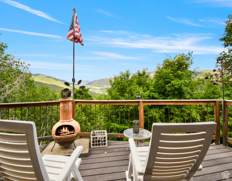 Wooden terrace with a mountain view