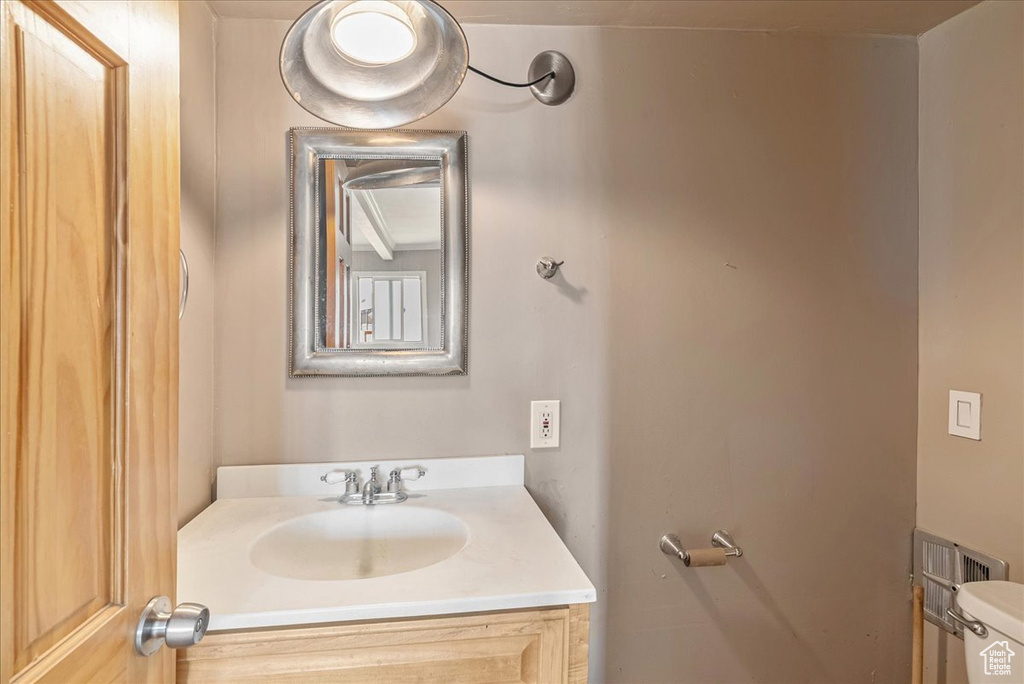 Bathroom with vanity and toilet