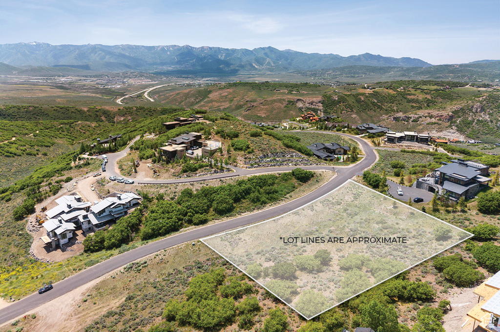 View of property location featuring a mountain backdrop and property parcel outlined