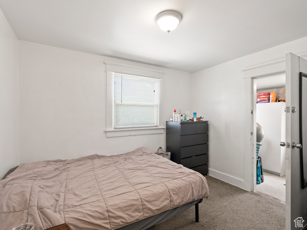 Bedroom featuring carpet floors