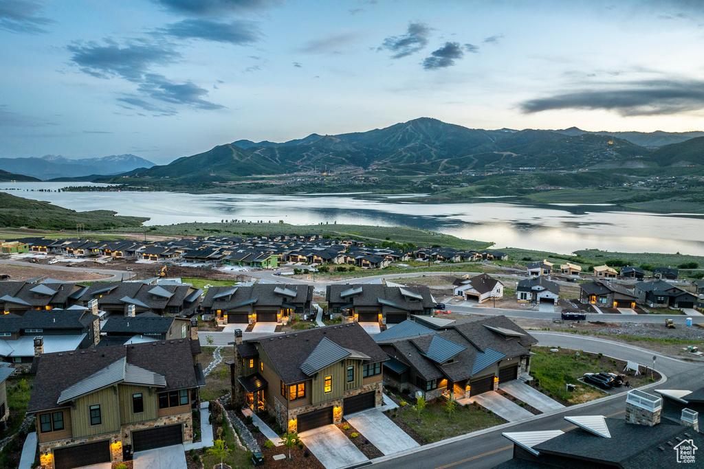 Aerial view of residential area with a water and mountain view