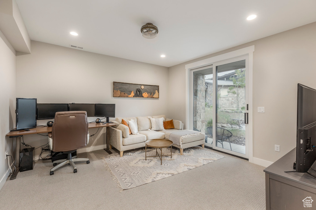 Carpeted office featuring baseboards and recessed lighting