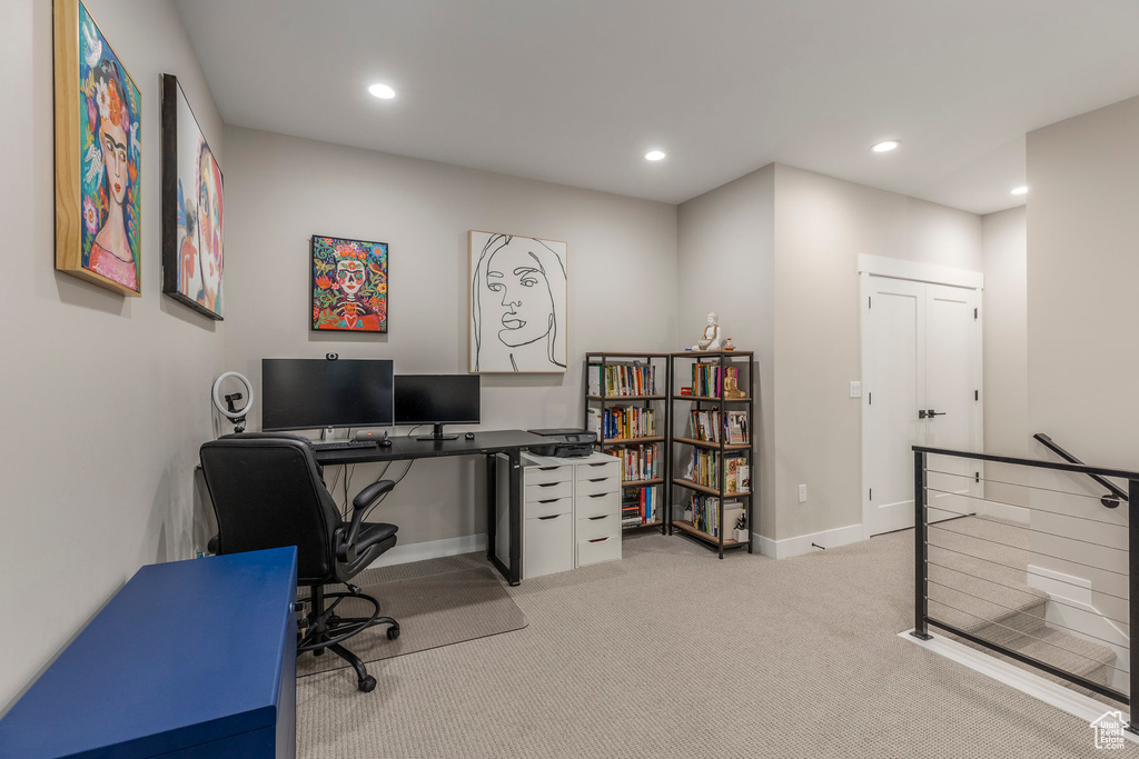 Office area with carpet flooring and recessed lighting