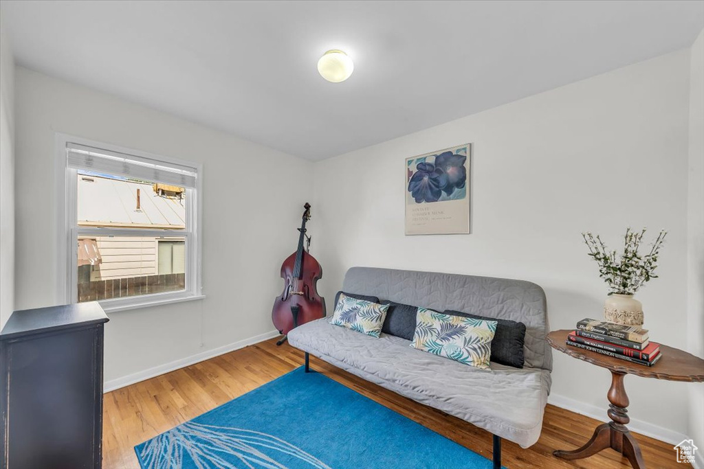 Sitting room featuring wood finished floors and baseboards
