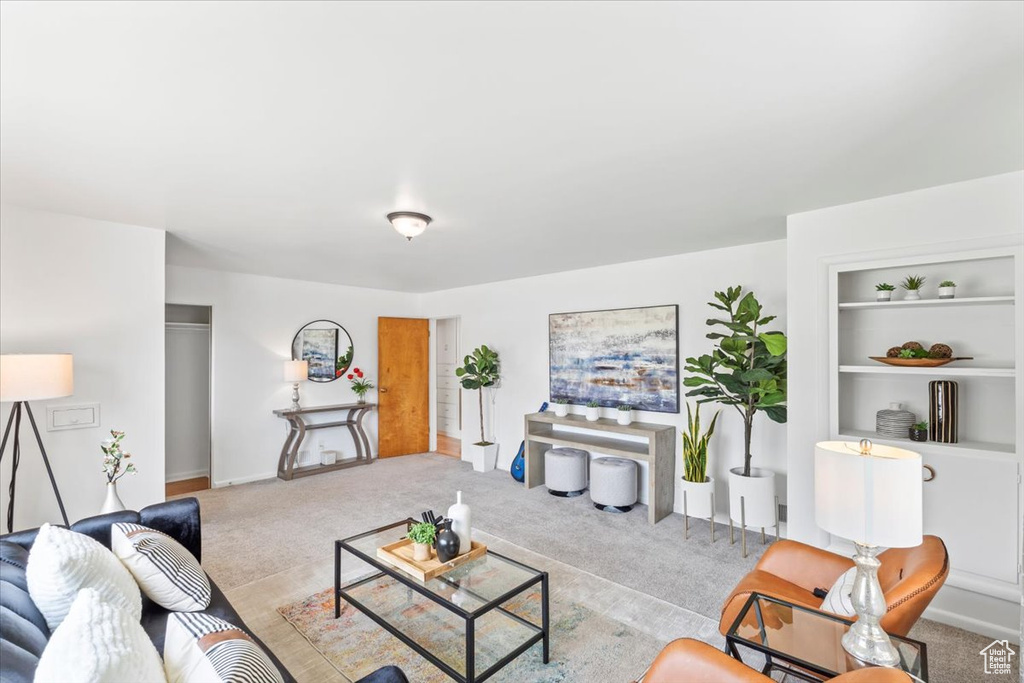 Living area with carpet flooring