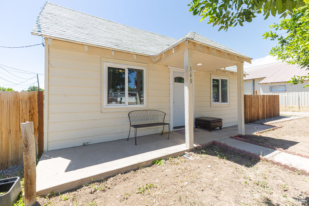 View of front of home with a patio area