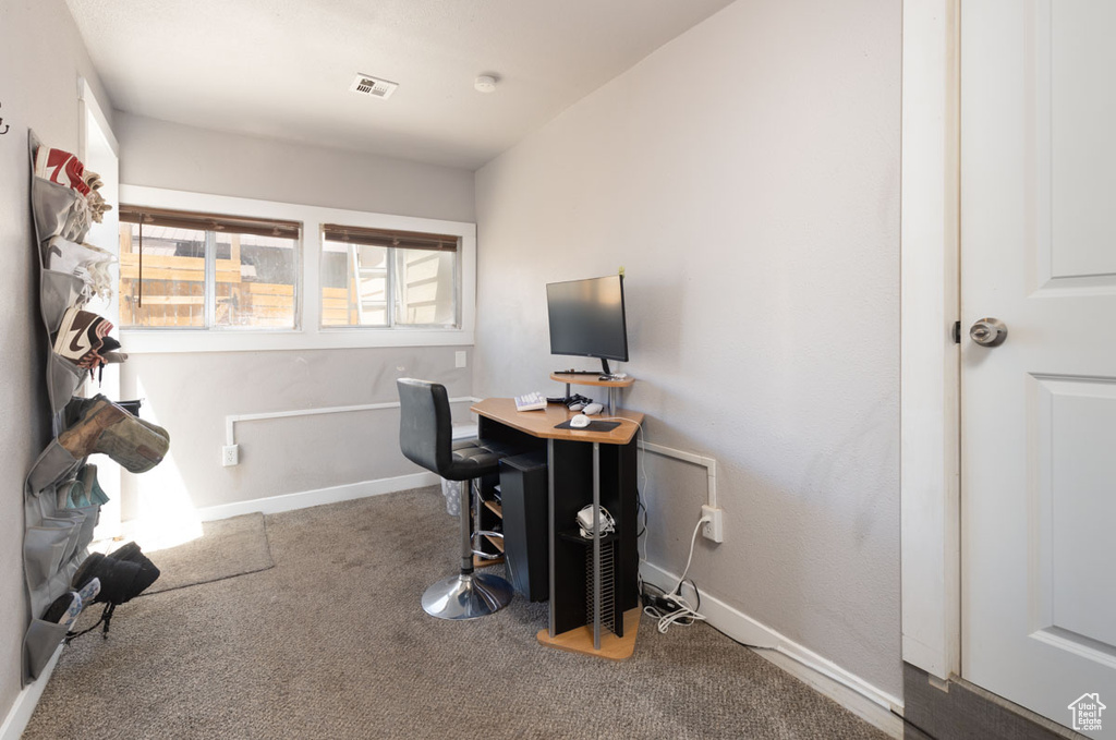 Office area with carpet and baseboards