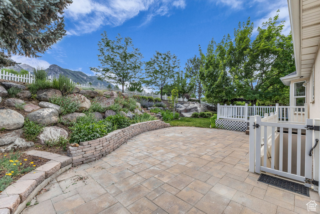 View of patio featuring a mountain view