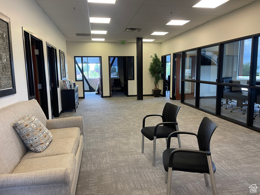 Community lobby with a paneled ceiling