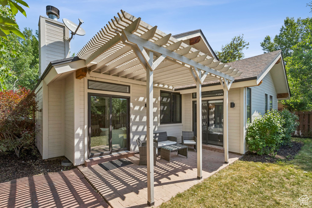View of patio featuring a pergola