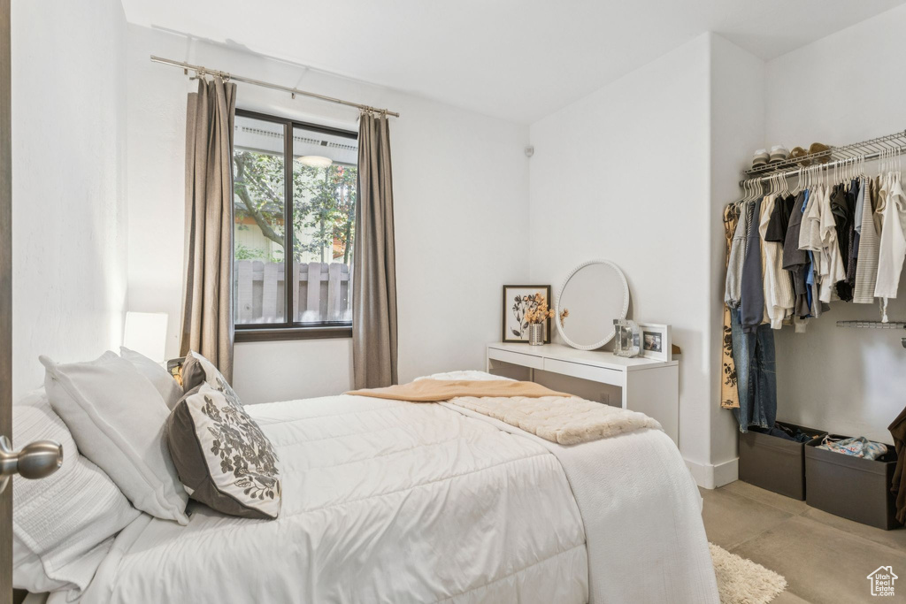 Bedroom featuring a closet and a walk in closet