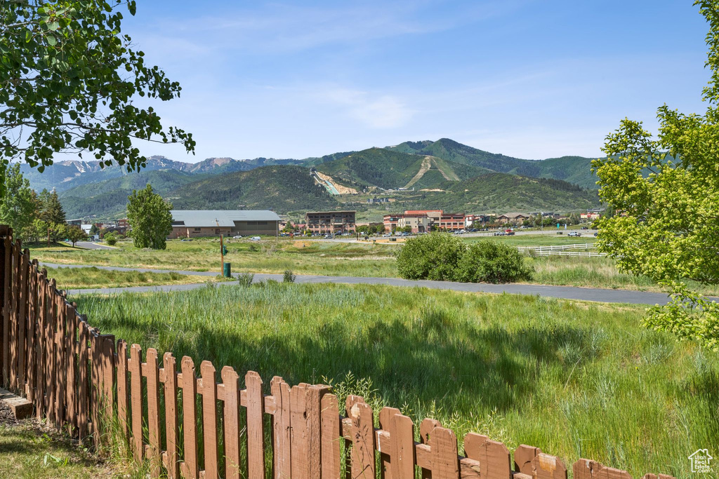 View of mountain backdrop featuring rural landscape