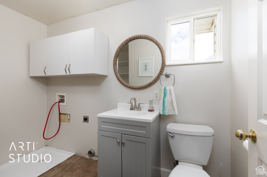 Bathroom with vanity and toilet