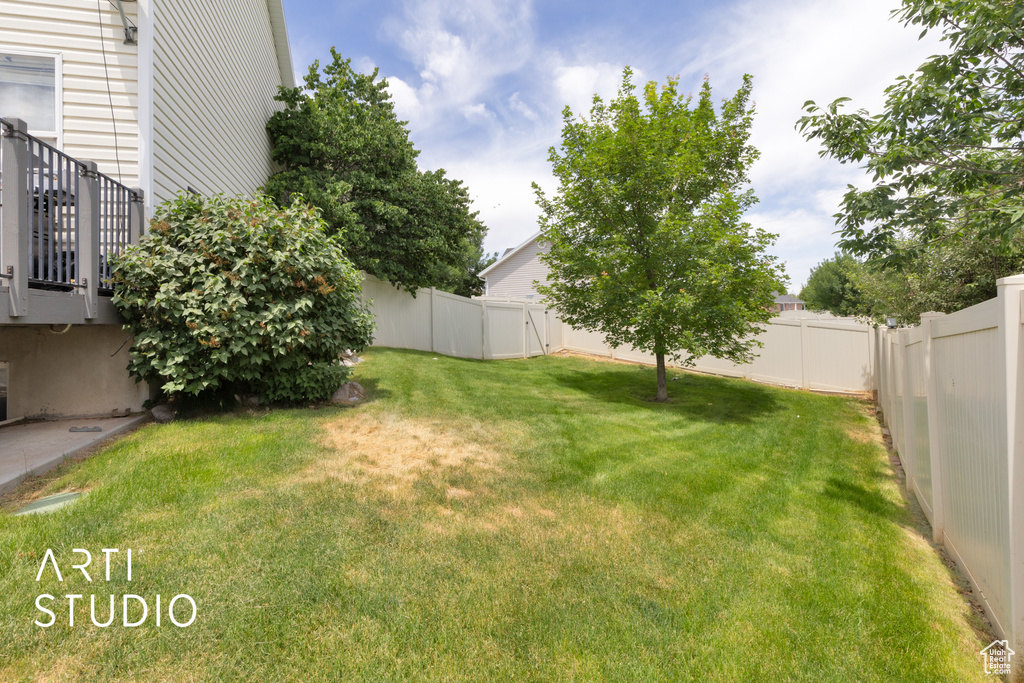 View of fenced backyard