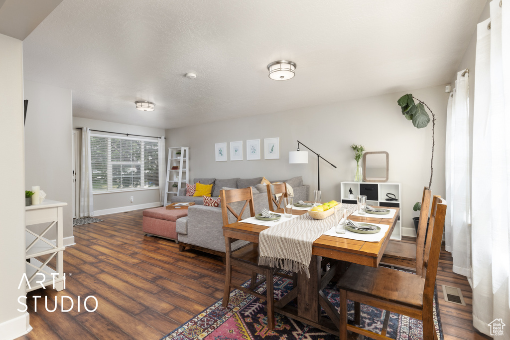 Dining area featuring wood finished floors