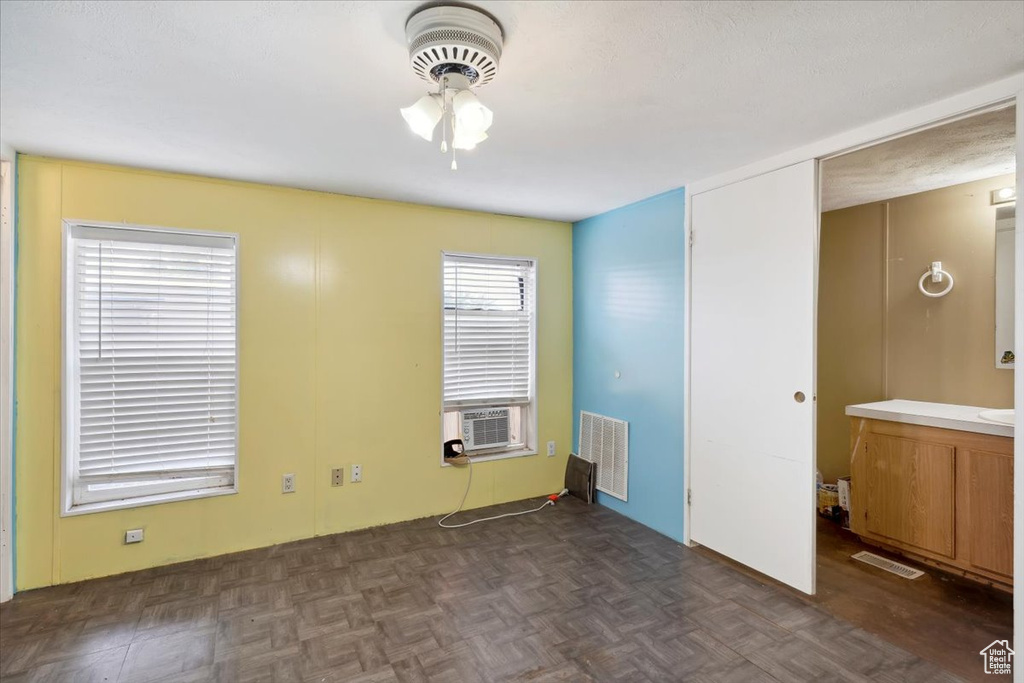 Spare room featuring a ceiling fan