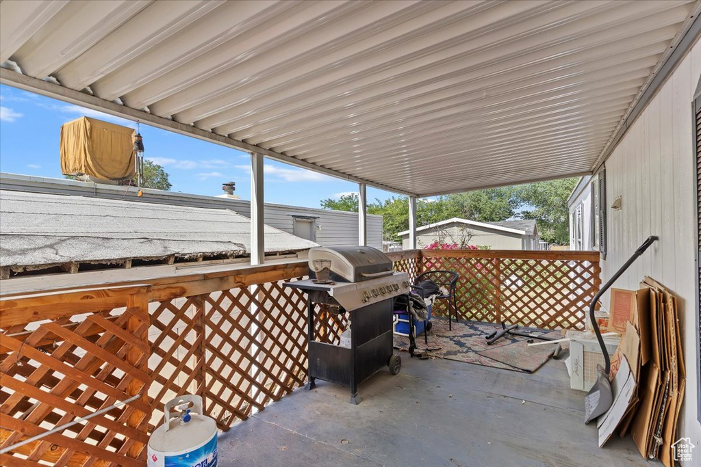 View of patio featuring area for grilling