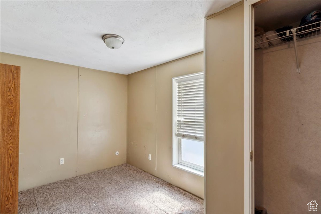 View of carpeted spare room