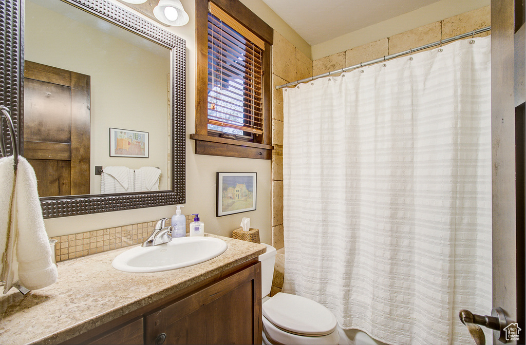 Bathroom with vanity and a shower with curtain