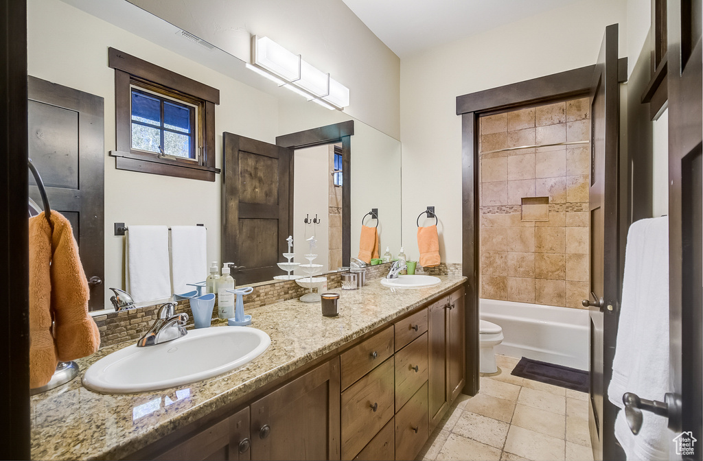 Full bath with double vanity and  shower combination
