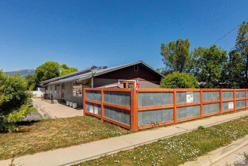 View of property exterior with a patio