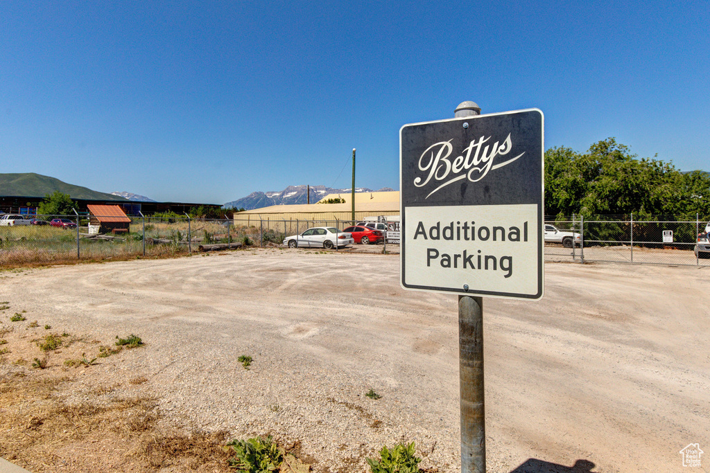 Exterior view of parking and a mountainous background