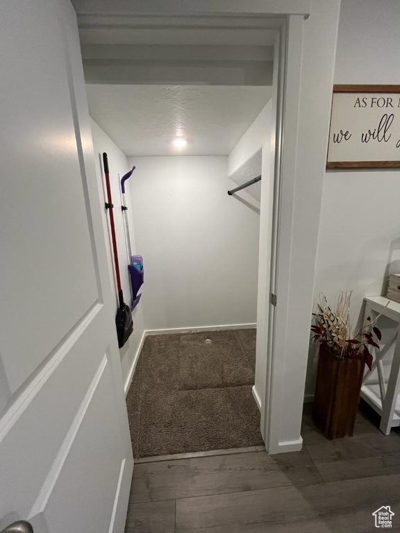 Interior space featuring wood finished floors and baseboards