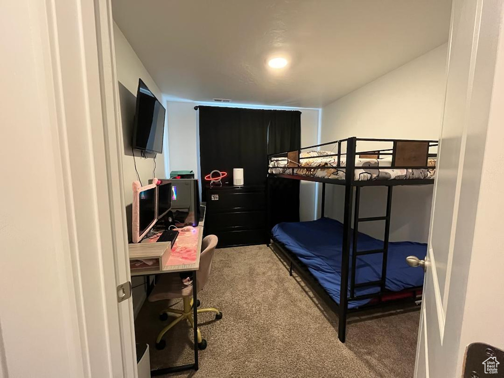 Bedroom featuring carpet