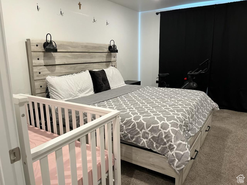 View of carpeted bedroom