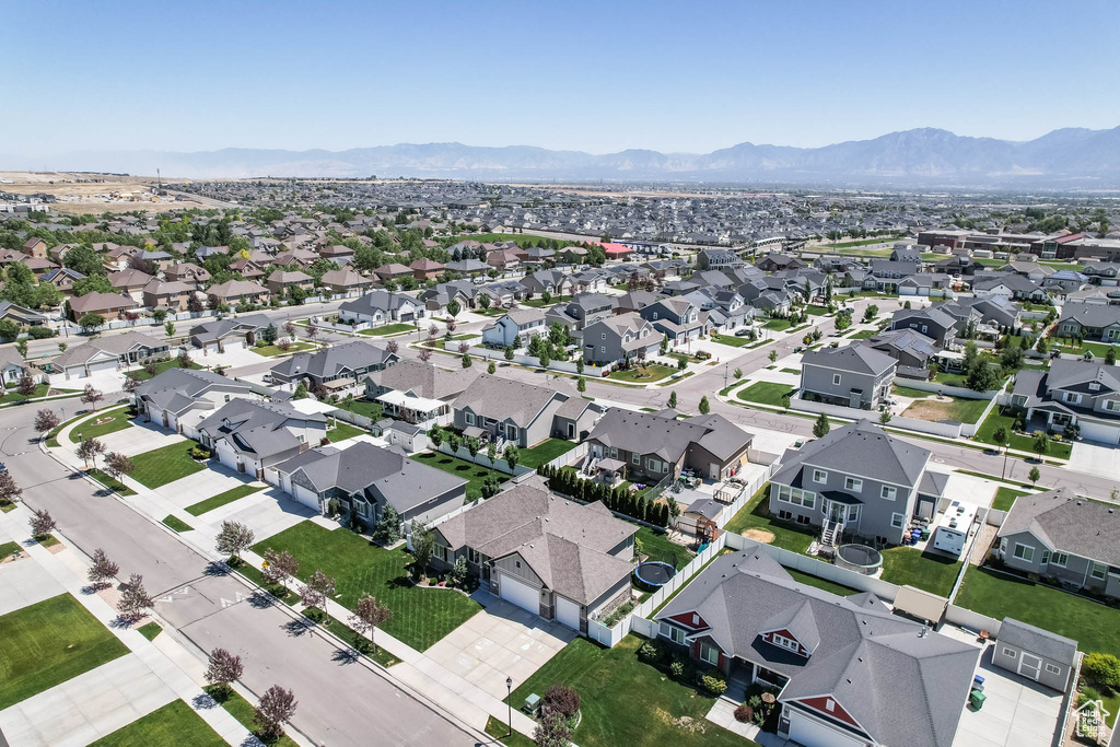 View of property location with a mountainous background and nearby suburban area