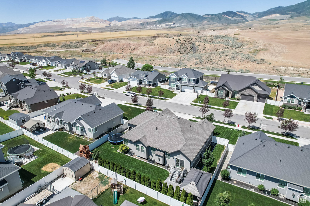 Aerial perspective of suburban area featuring mountains