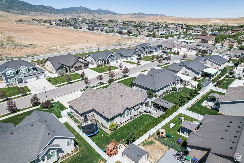 Aerial view of residential area with mountains