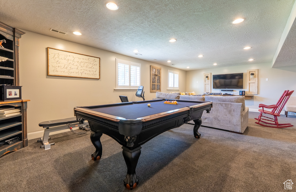 Game room with a textured ceiling, recessed lighting, carpet flooring, and billiards table