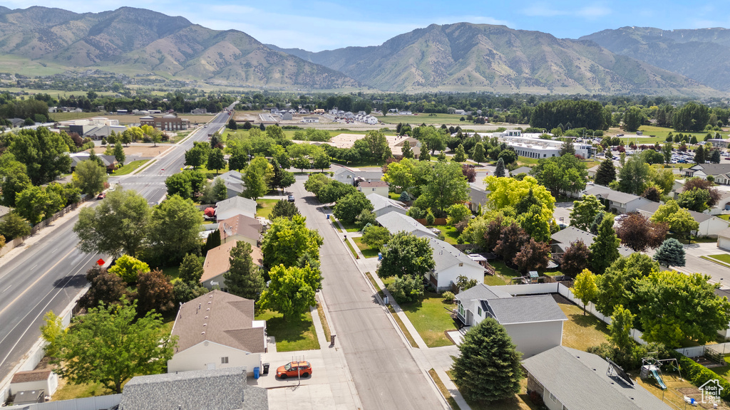 Aerial view of residential area featuring mountains