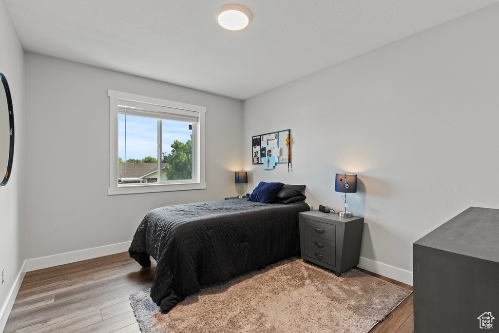 Bedroom featuring wood finished floors