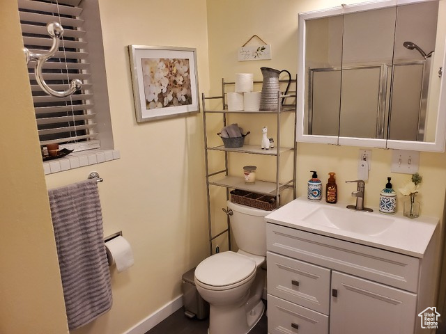 Bathroom with vanity and toilet