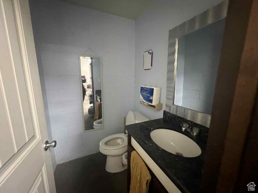 Bathroom with vanity and toilet