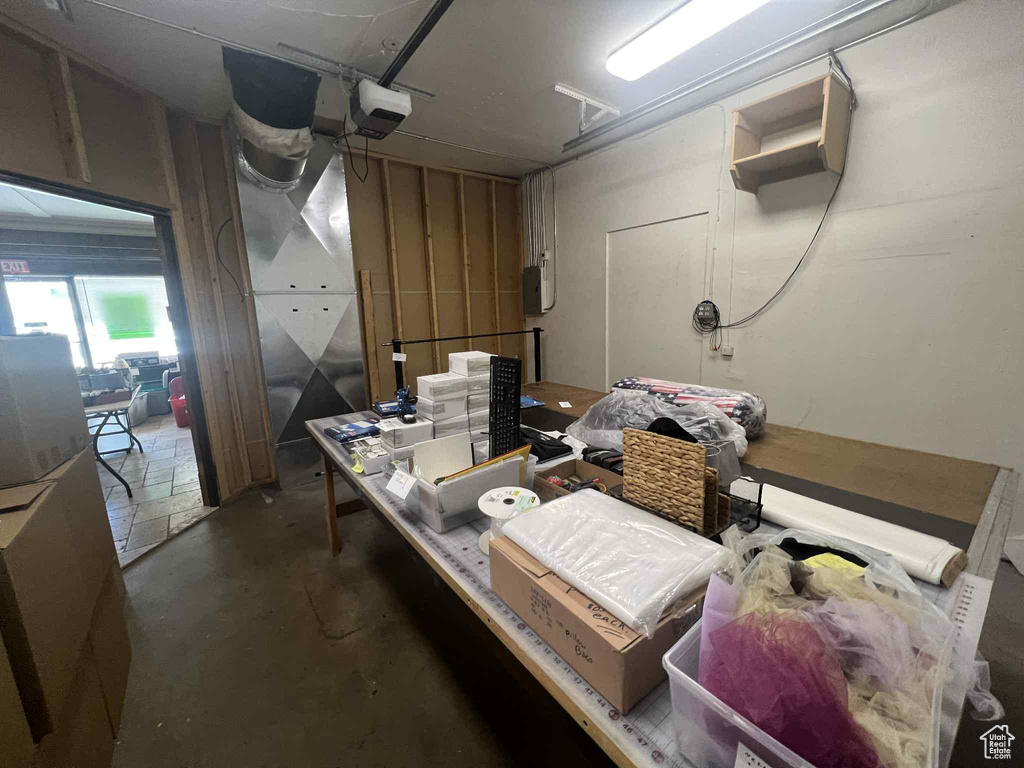 Garage featuring a garage door opener