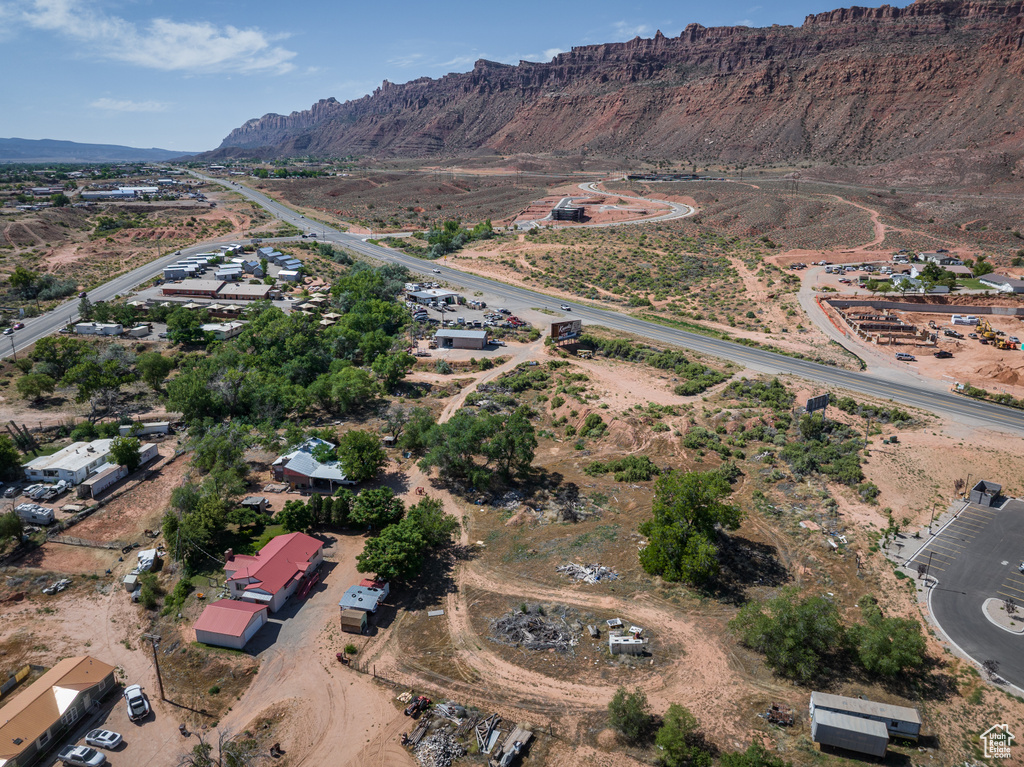 View of property location featuring a mountainous background and rural landscape