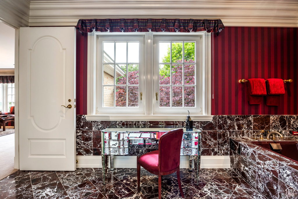 Dining area featuring marble finish flooring