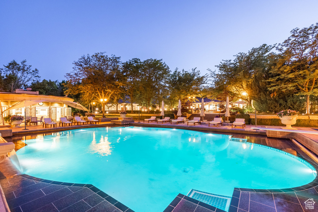 Swimming pool with a patio