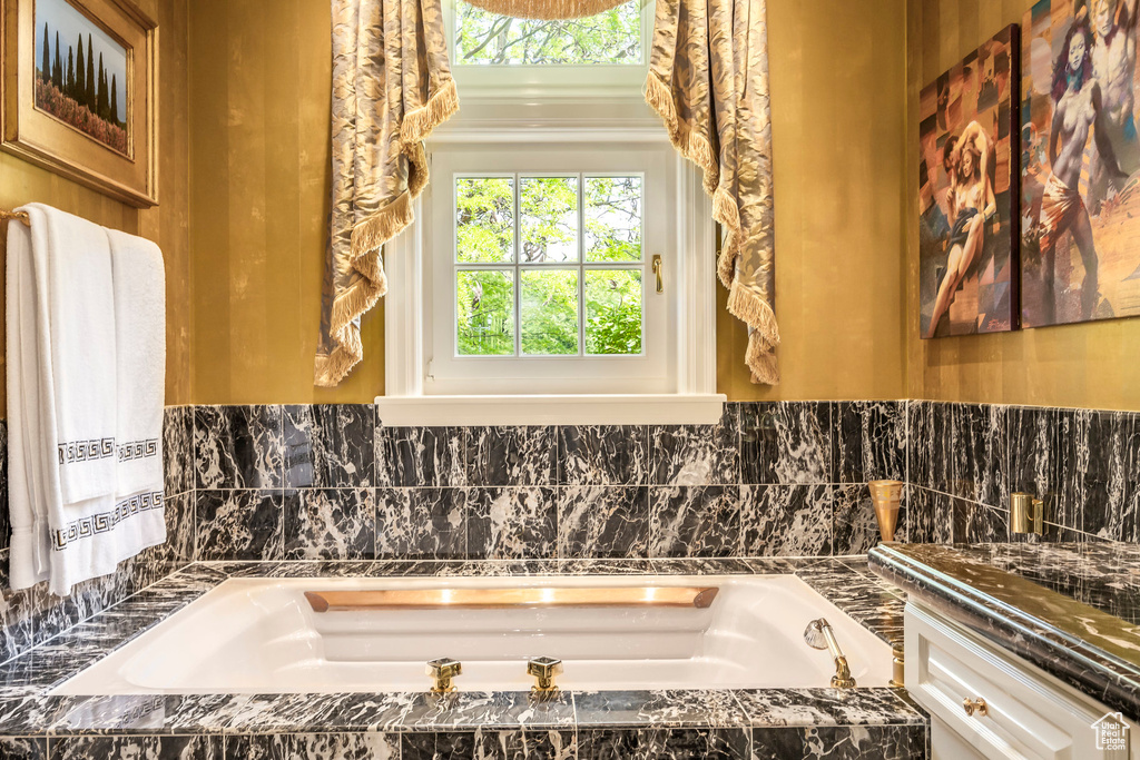 Full bath with a bath