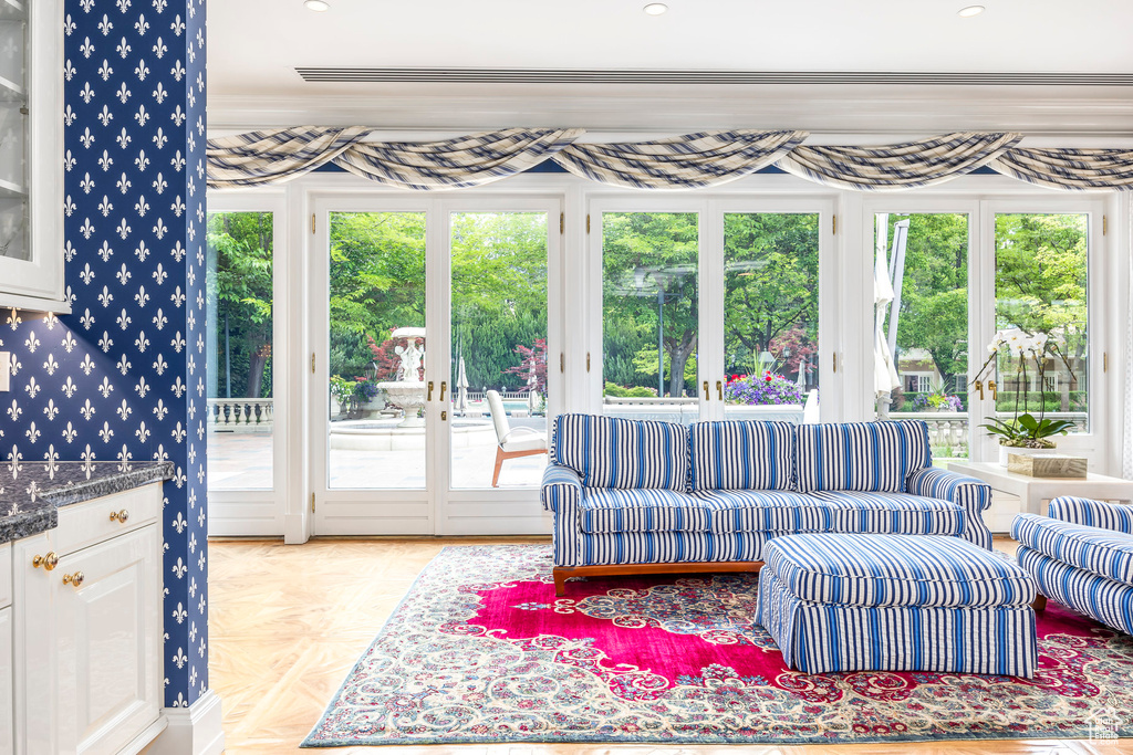 Living area with wallpapered walls