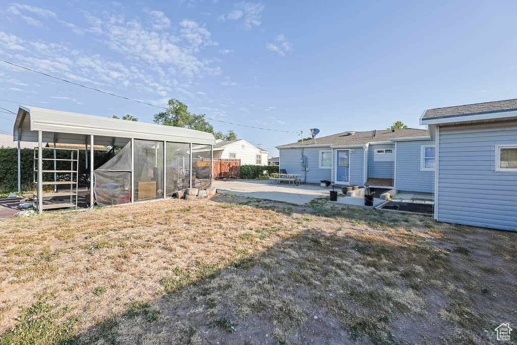 View of yard with a patio